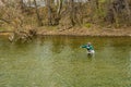 Fisherman Casting an Artificial Fly for Trout in Roanoke River, Virginia, USA Royalty Free Stock Photo